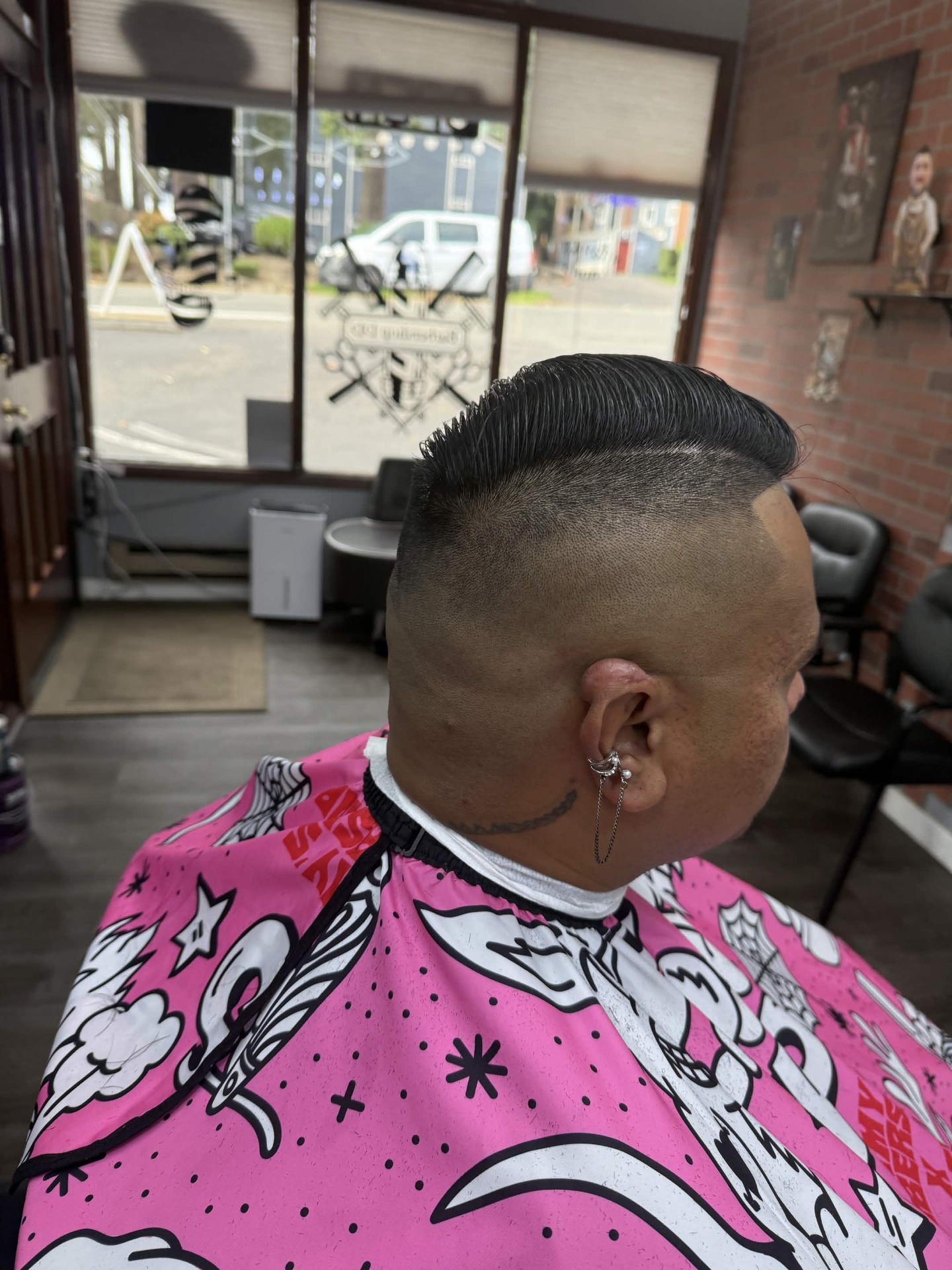Mohawk fade with sharp line