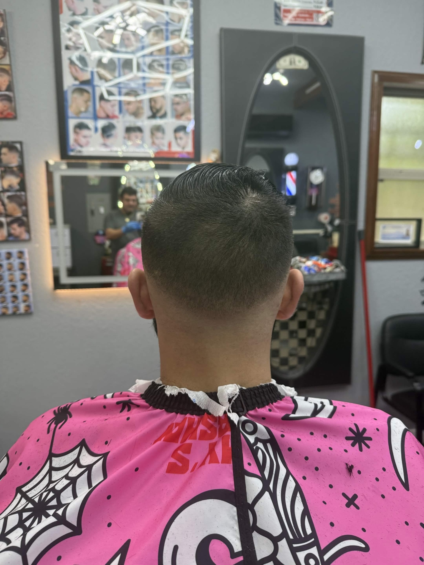 Clean comb-over fade — back view