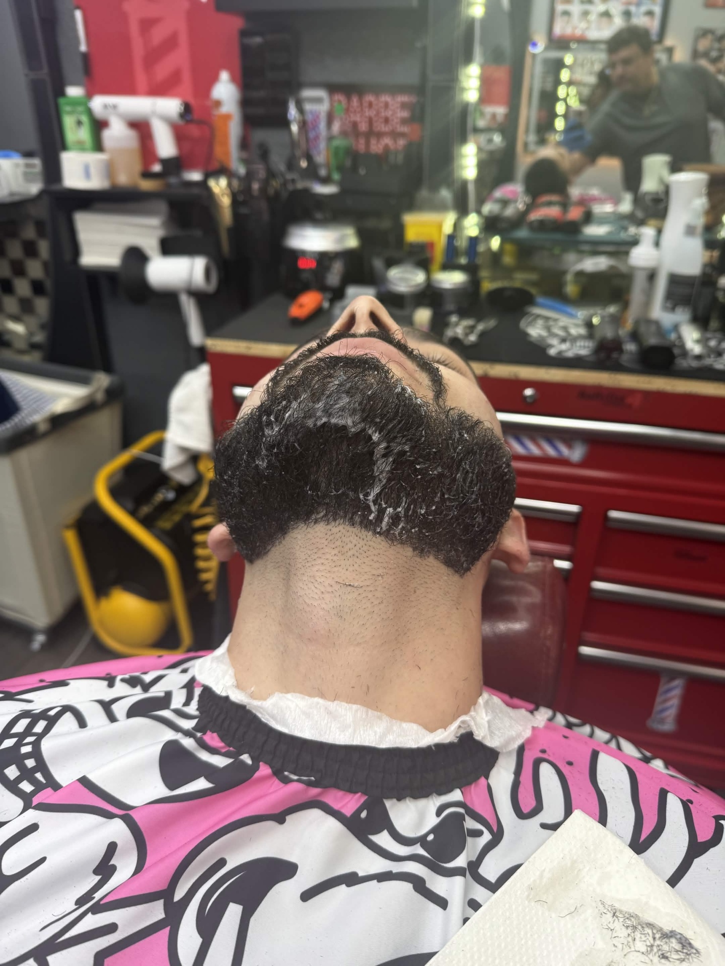 Curly textured cut — back view