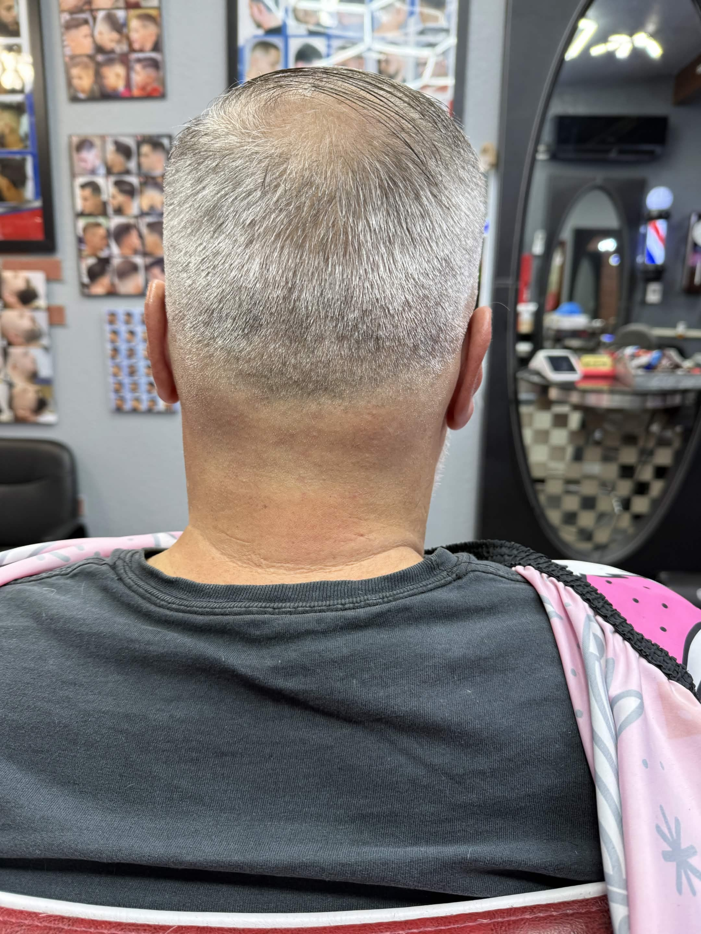 Low fade buzz — back view
